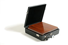 Mahogany object in suitcase, 1976by LG Lundberg. Click on the picture for an enlarged version.