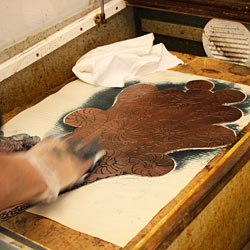 Washing with white spirit in order to remove the ink.