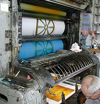 The final result appears in the printing press.