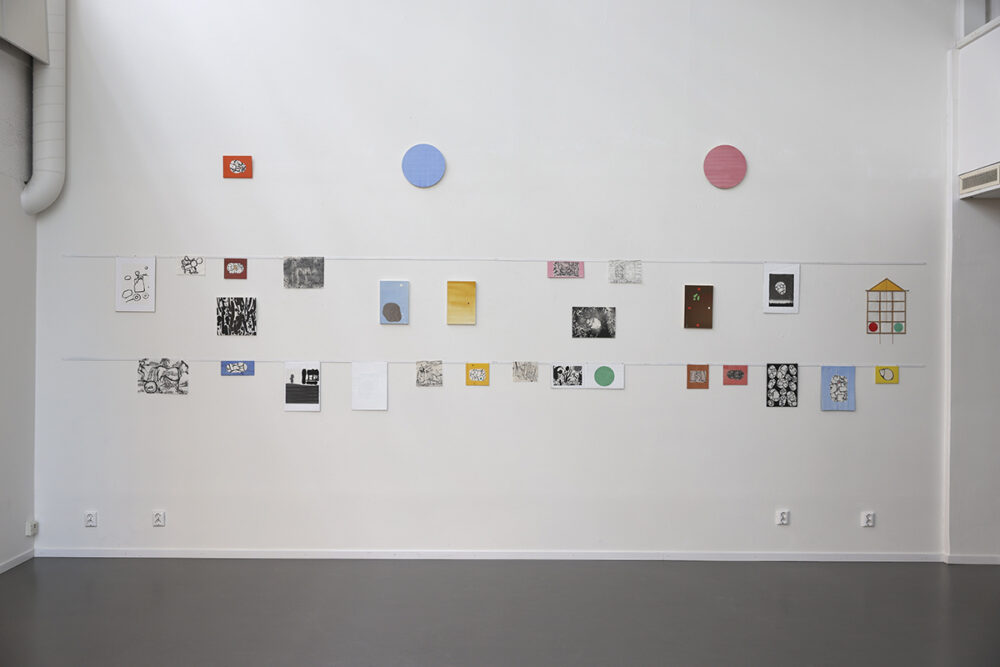 Dan Wirén's wall installation with a number of works made with different techniques and materials.